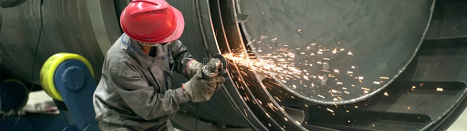 Workers are manufacturing rotary dryers